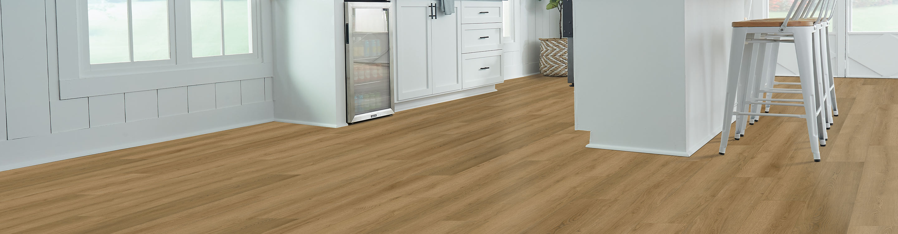living room with luxury vinyl flooring and white area rug